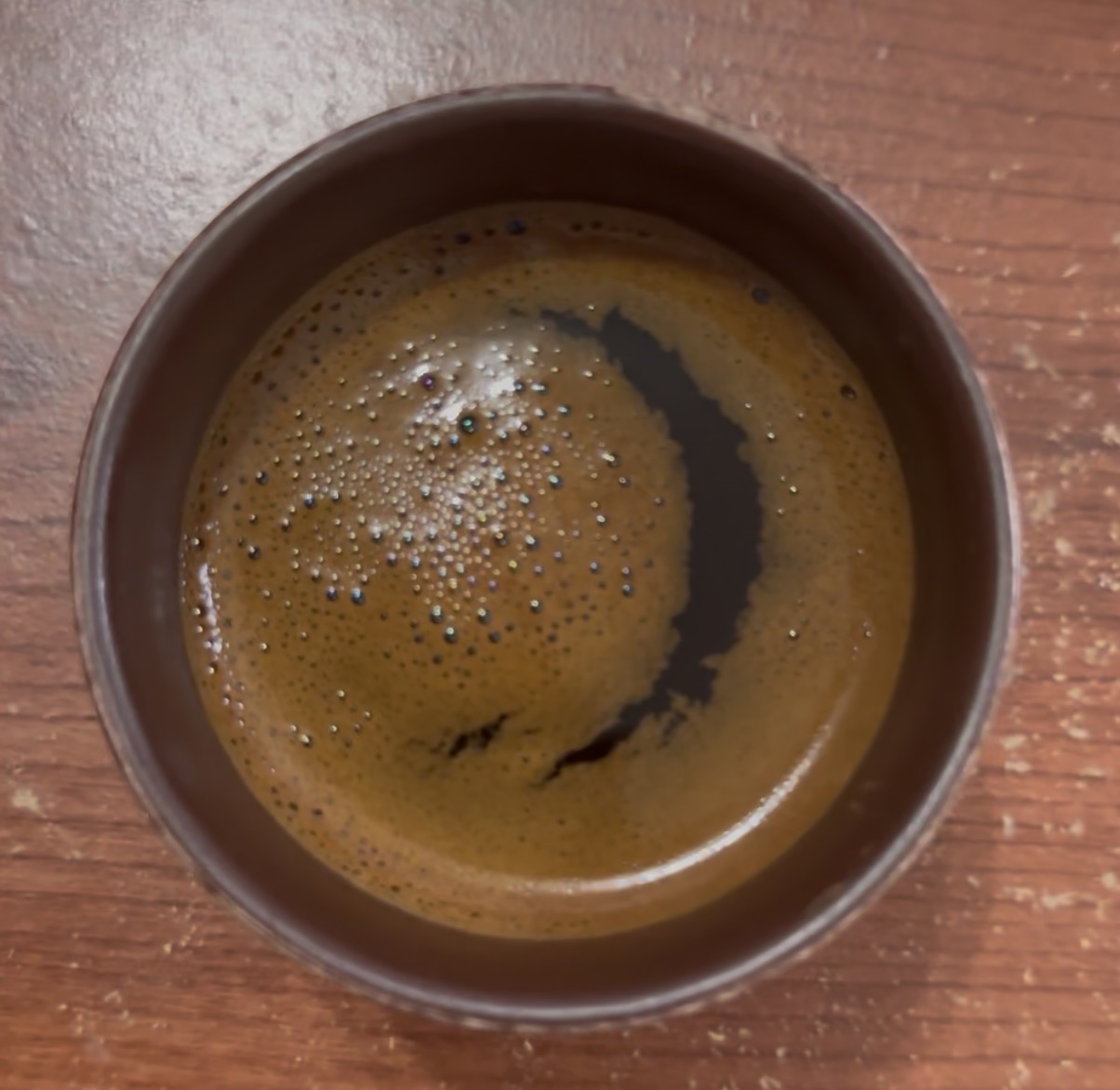 A cup of Turkish coffee with foam
